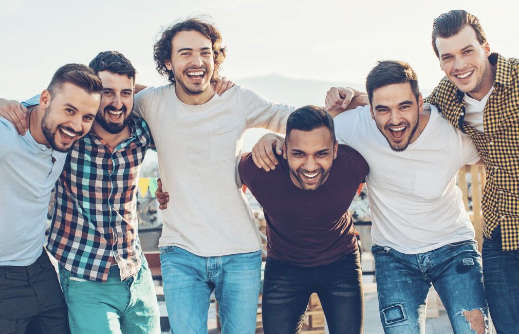 A group of male friends laughing