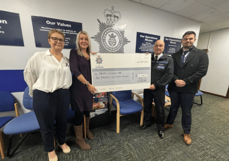 Peterborough Women's Aid's head of fundraising, and CEO, and Cambridgeshire Constabulary Chief Constable Nick Dean, joined by Fed member Ollie