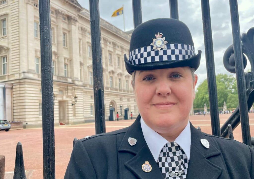 Liz outside Buckingham Palace